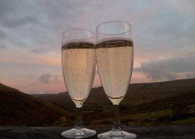 A toast on Lovely Seat balcony. Cheers! - Kirsty Hall at Swaledale Country Holidays